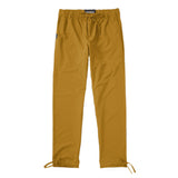 Trailhead Pants showcased in a mustard color